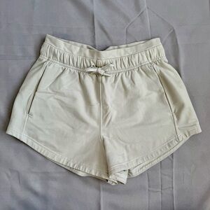 lululemon Inner Glow Shorts in color bone
